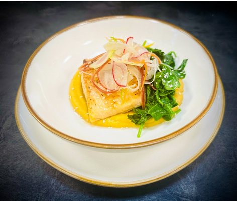 Plated fish with shaved radish